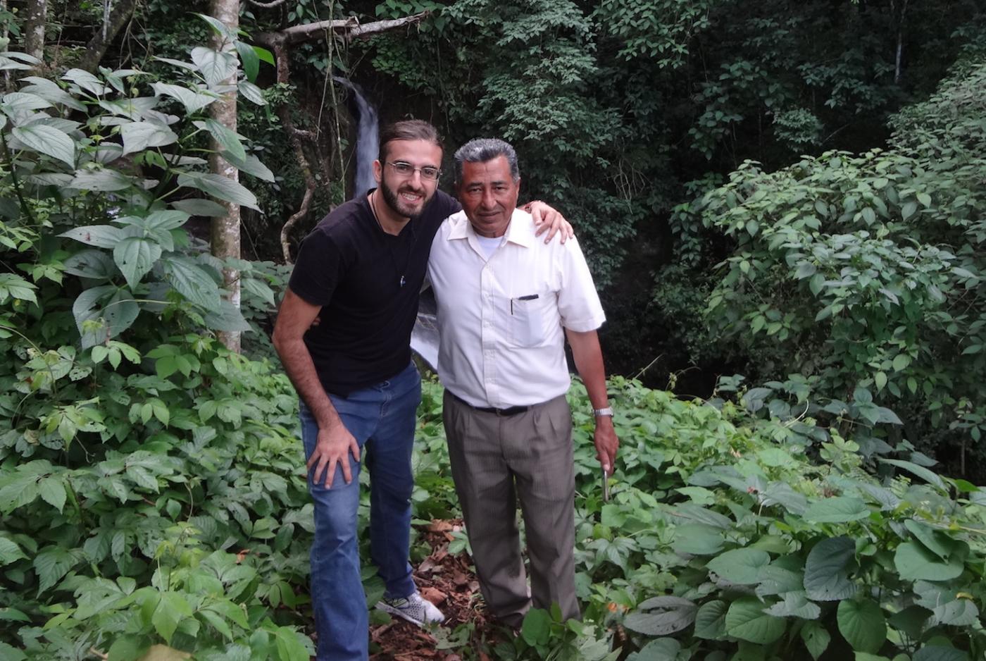 Daniel poses with a local farmer in the mountains of Copan, Honduras, where he works as a human rights advocate. 