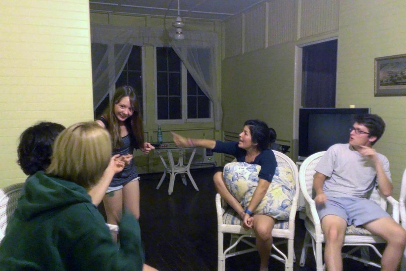 Game night began with charades in the villa on this July evening.