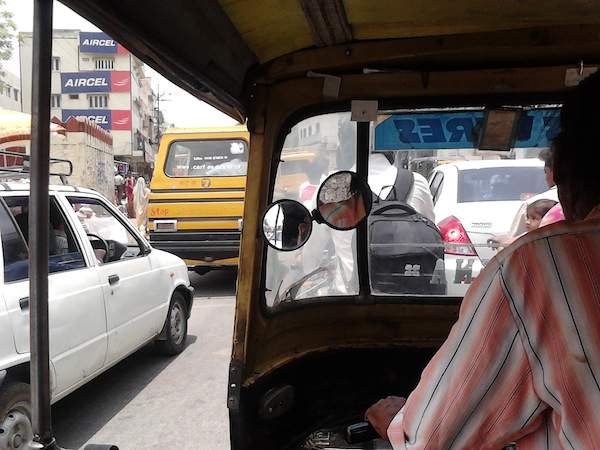 The view from inside an auto-rickshaw.