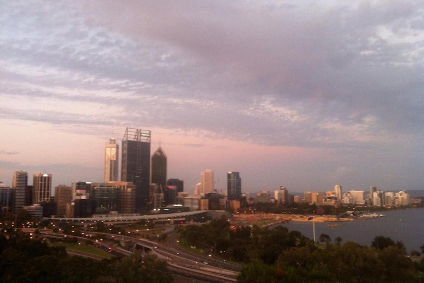 The sun sets over Perth, Australia.