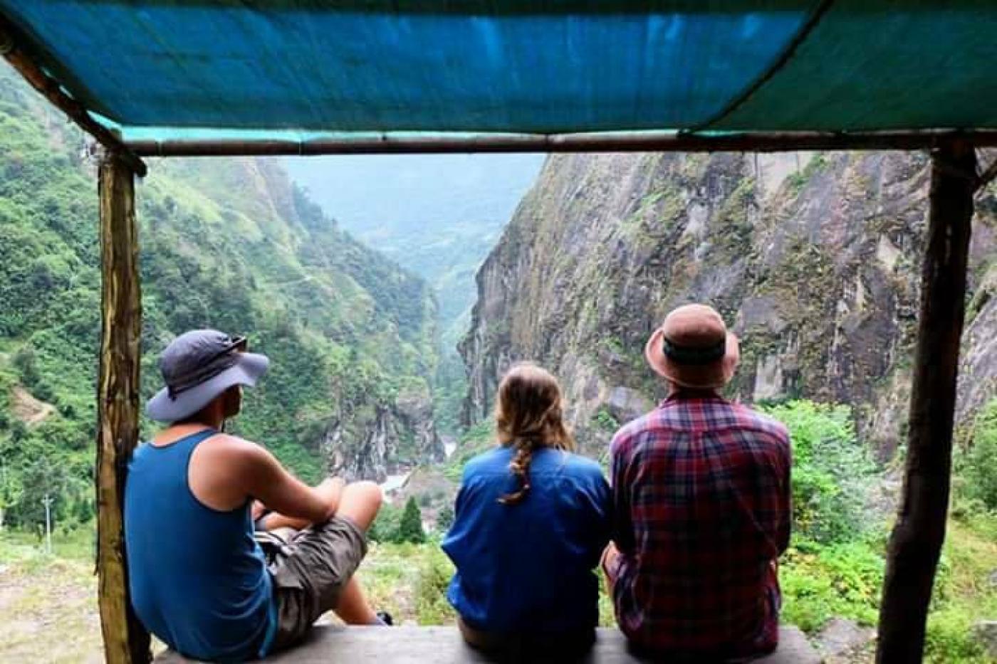 A moment of contemplation with friends after a gruelling afternoon of trekking in Nepal.