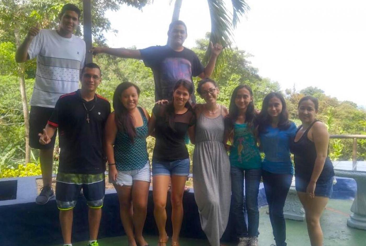 Tishley (centre, in grey dress) with her students in Costa Rica.