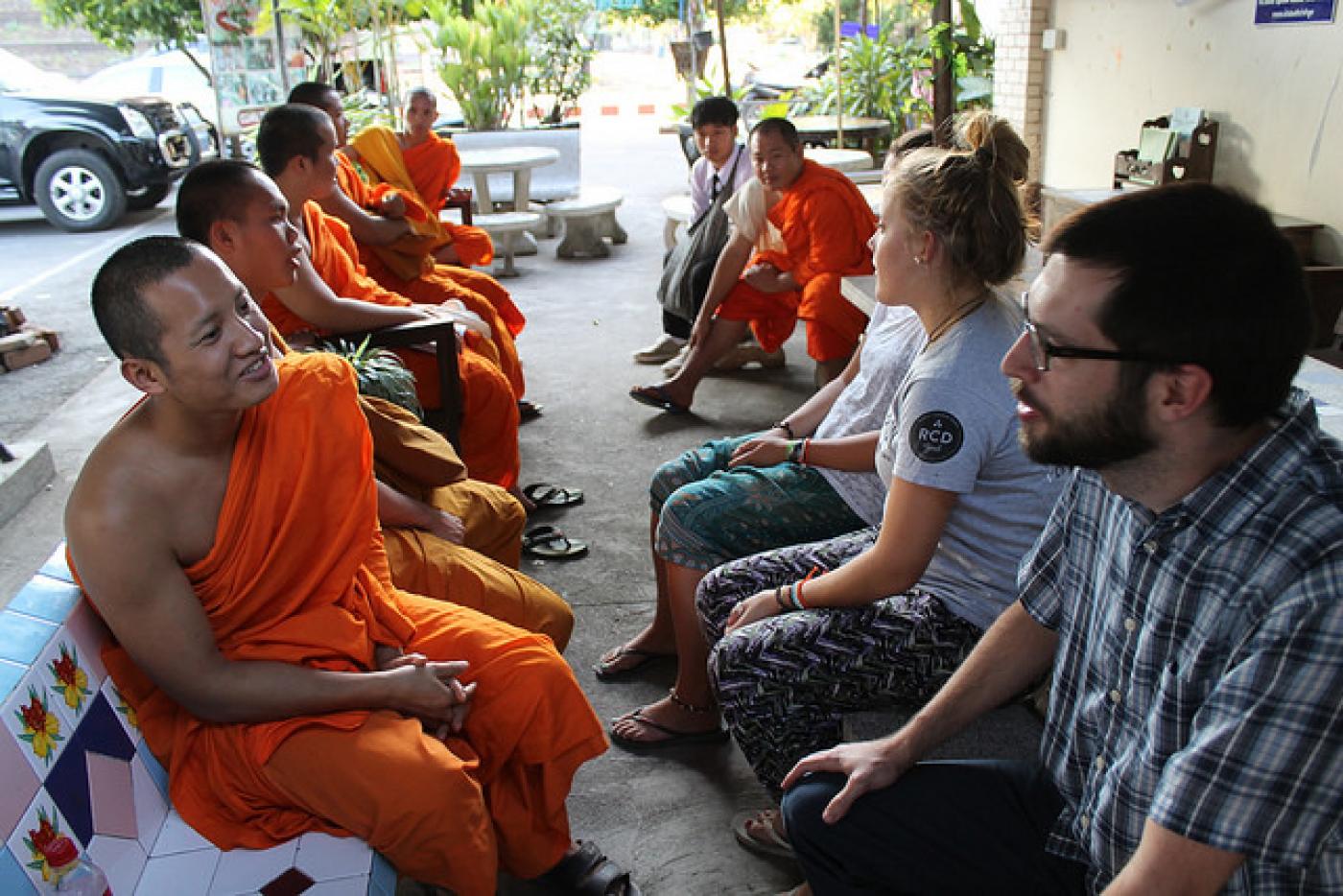 A monk chat taking place in Thailand. 