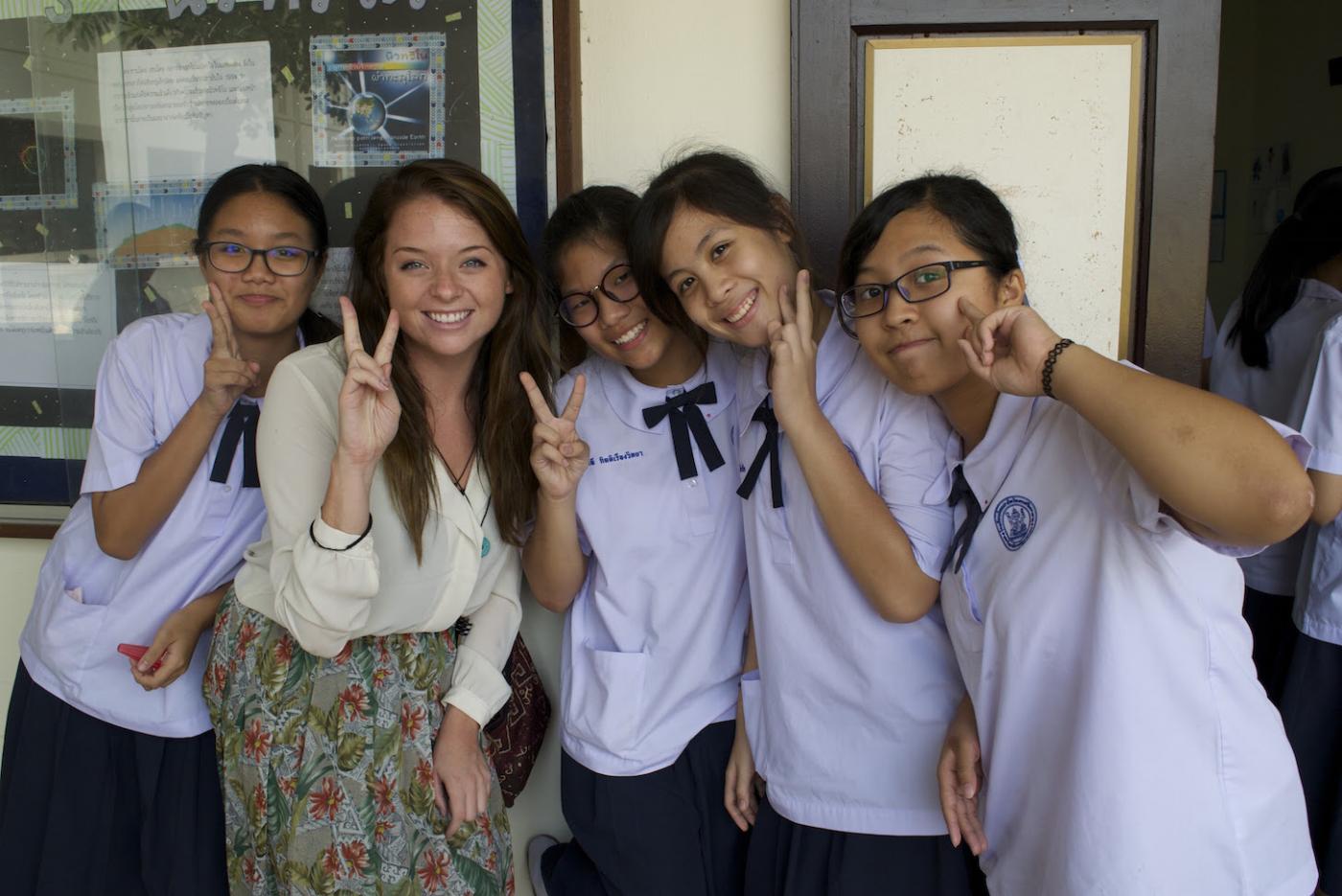 The writer, Kelly, with some of her students in Thailand. 