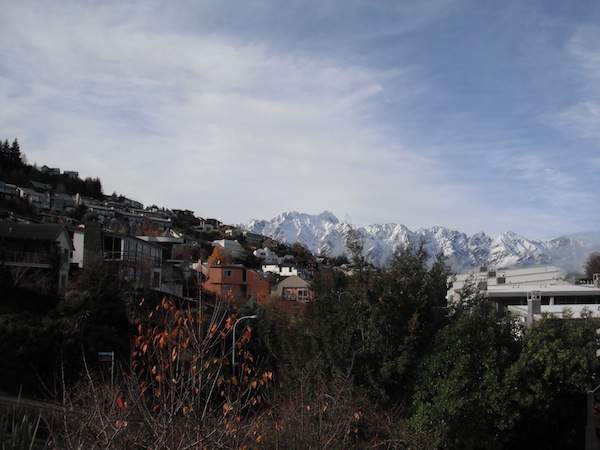 The view from Taylor&#039;s back balcony, facing the snow-covered Remarkables mountain range.