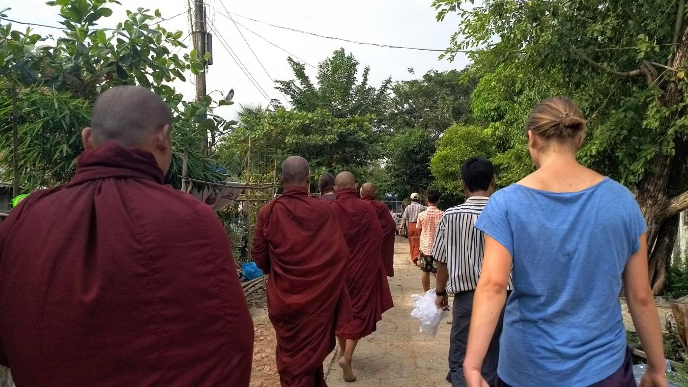 Collecting daily alms food from the village while volunteering at Thabarwa Meditation Center.