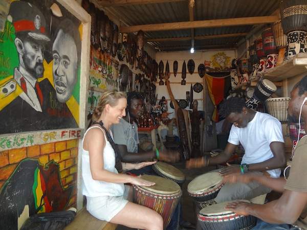 Michelle learns to drum in Ghana.